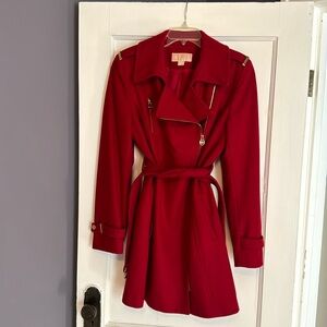 Michael Kors red belted wool coat with gold accents.